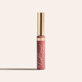 LipSense long lasting liquid lip color in a slim tube with a gold cap and rosy shade